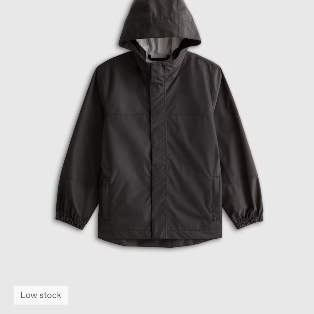 Quince Black Water Proof Hooded Rain Jacket - Size 12. Boys or Unisex